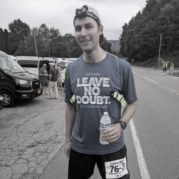 A team member wearing the shirt at a race